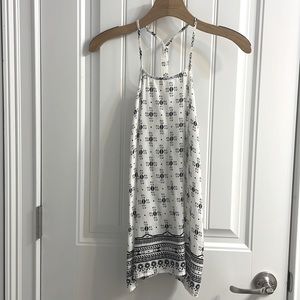 Cute breezy tank top. The size is S/P.